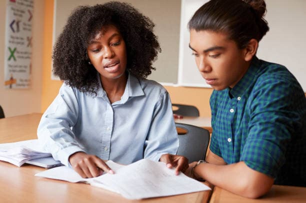 Tutor working one-on-one with a student