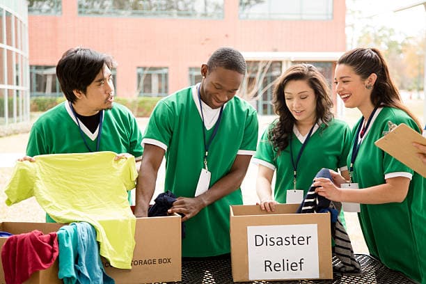 Volunteers sorting disaster relief supplies